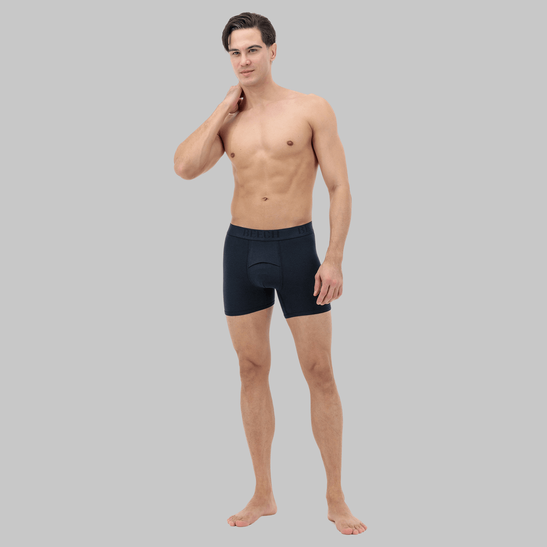 Full view of navy mid-length boxer with fly – designed for breathability, sensitive skin comfort, and moisture control
